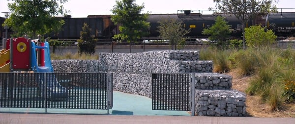 playground surrounded by gabions